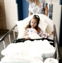 Sick Child in Hospital Bed