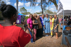 BBQ-group-of-women-friends-smiling-for-phone-camera_thumb